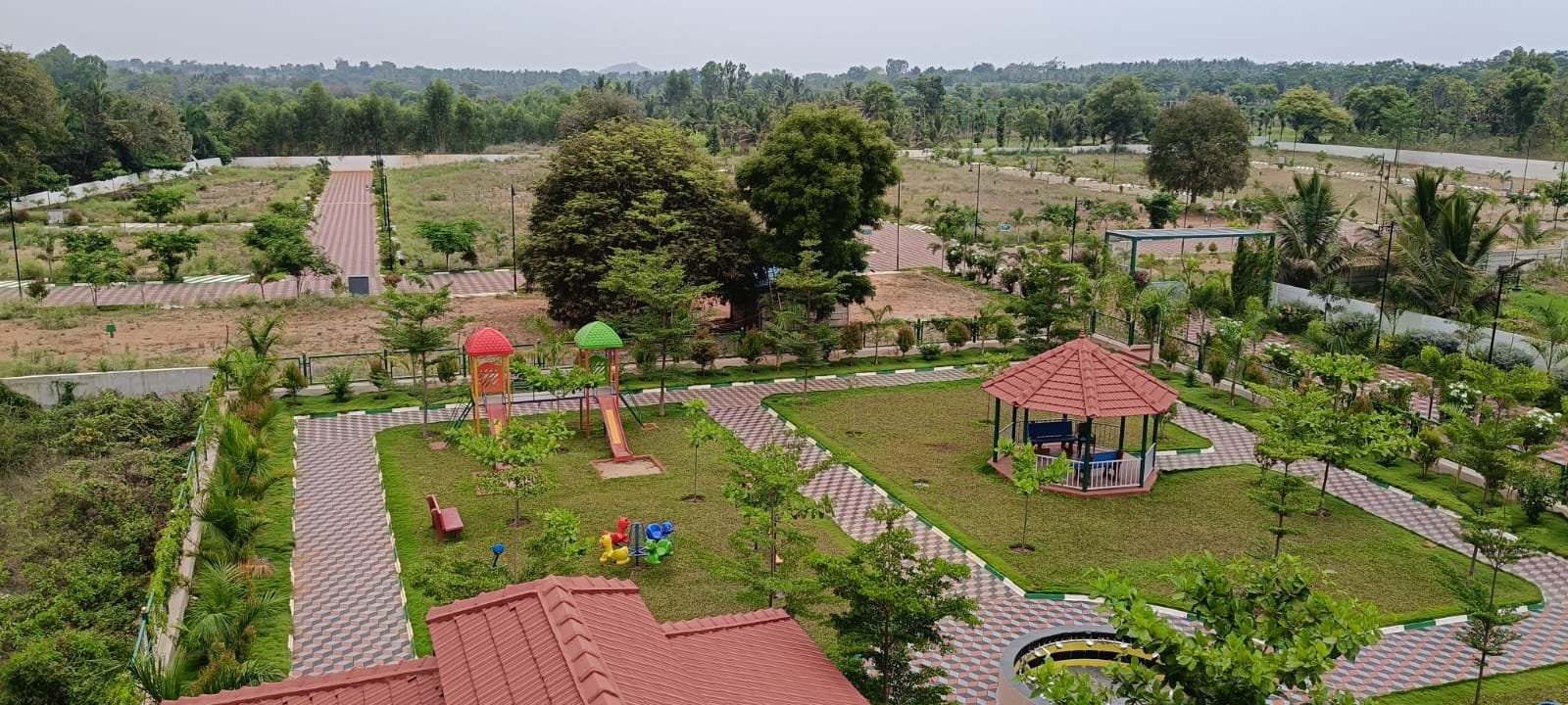 Lush Green Park with Gazebo and Children Play Arena